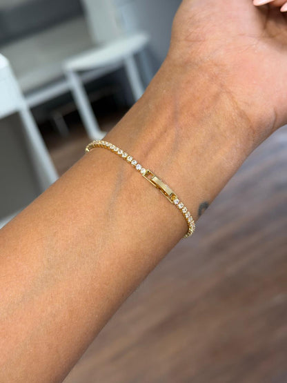 Golden evil eye tennis bracelet