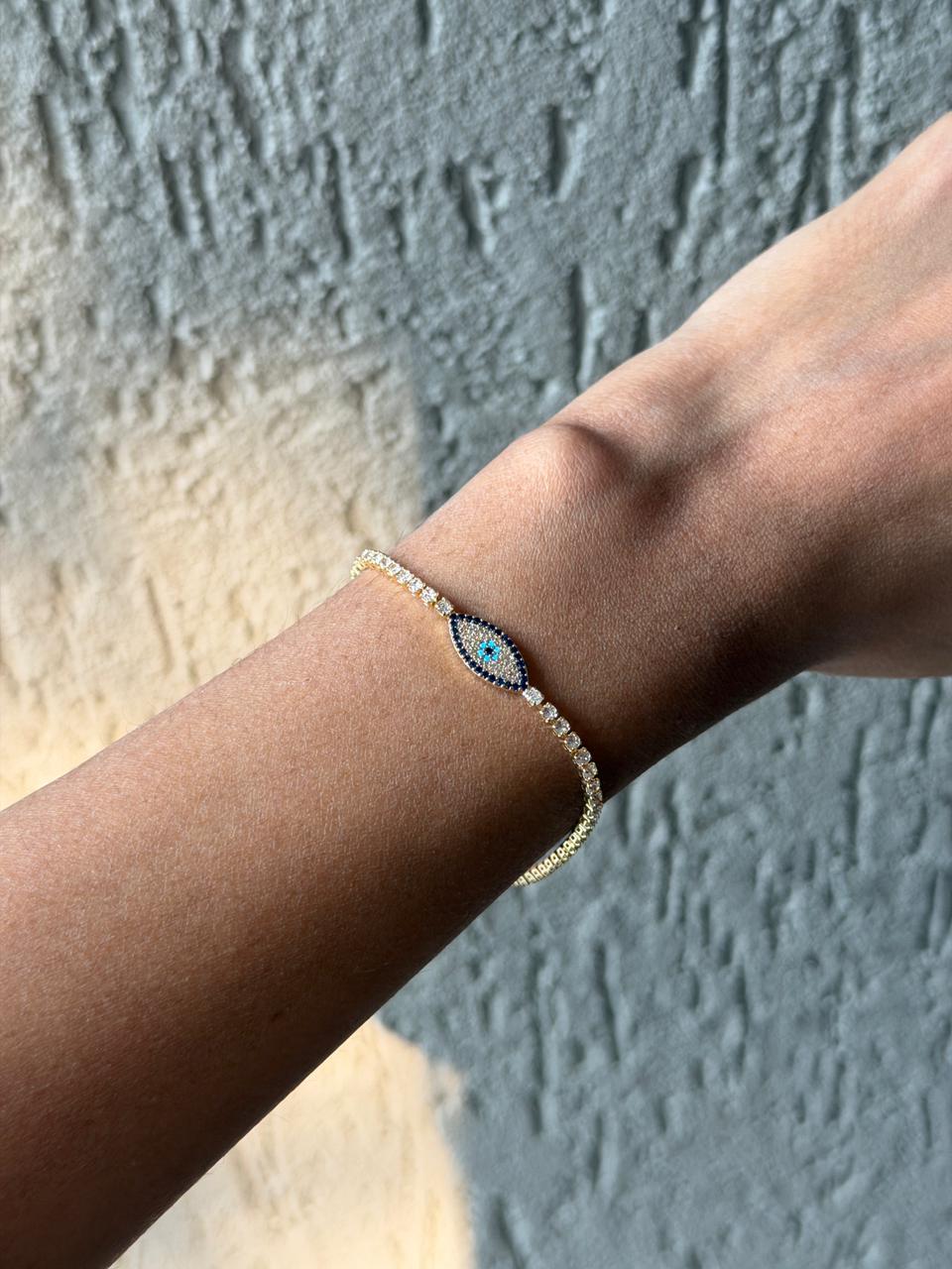 Golden evil eye tennis bracelet