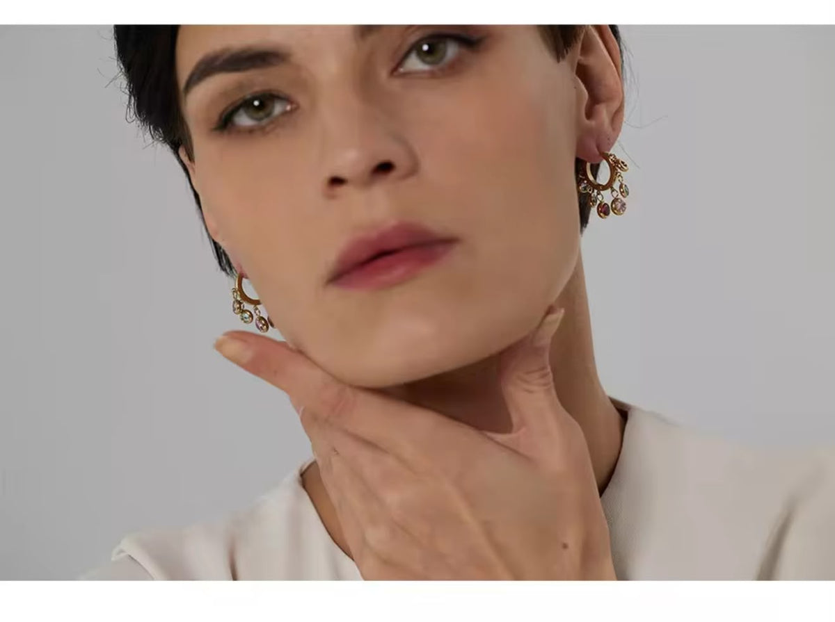 Dangling White stone earrings